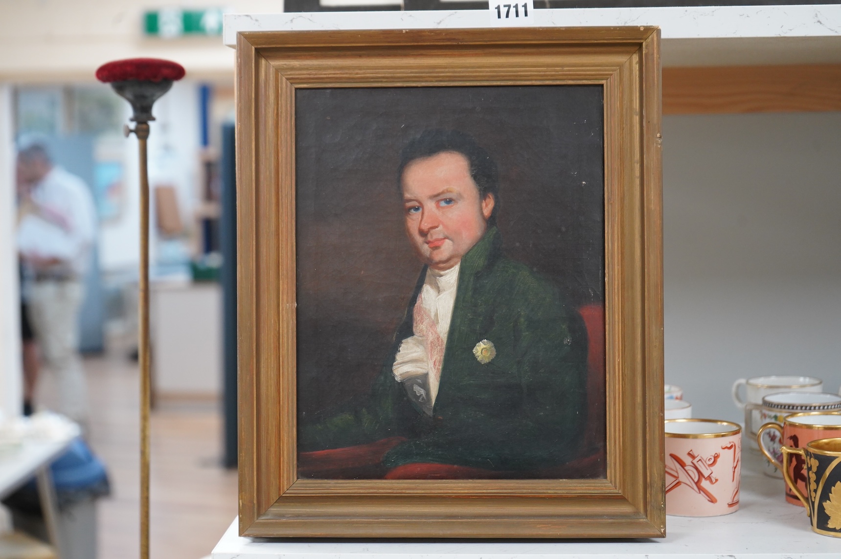18th century, English School, Portrait of a gentleman wearing a green frock coat, unsigned, oil on canvas, 17 x 21cm